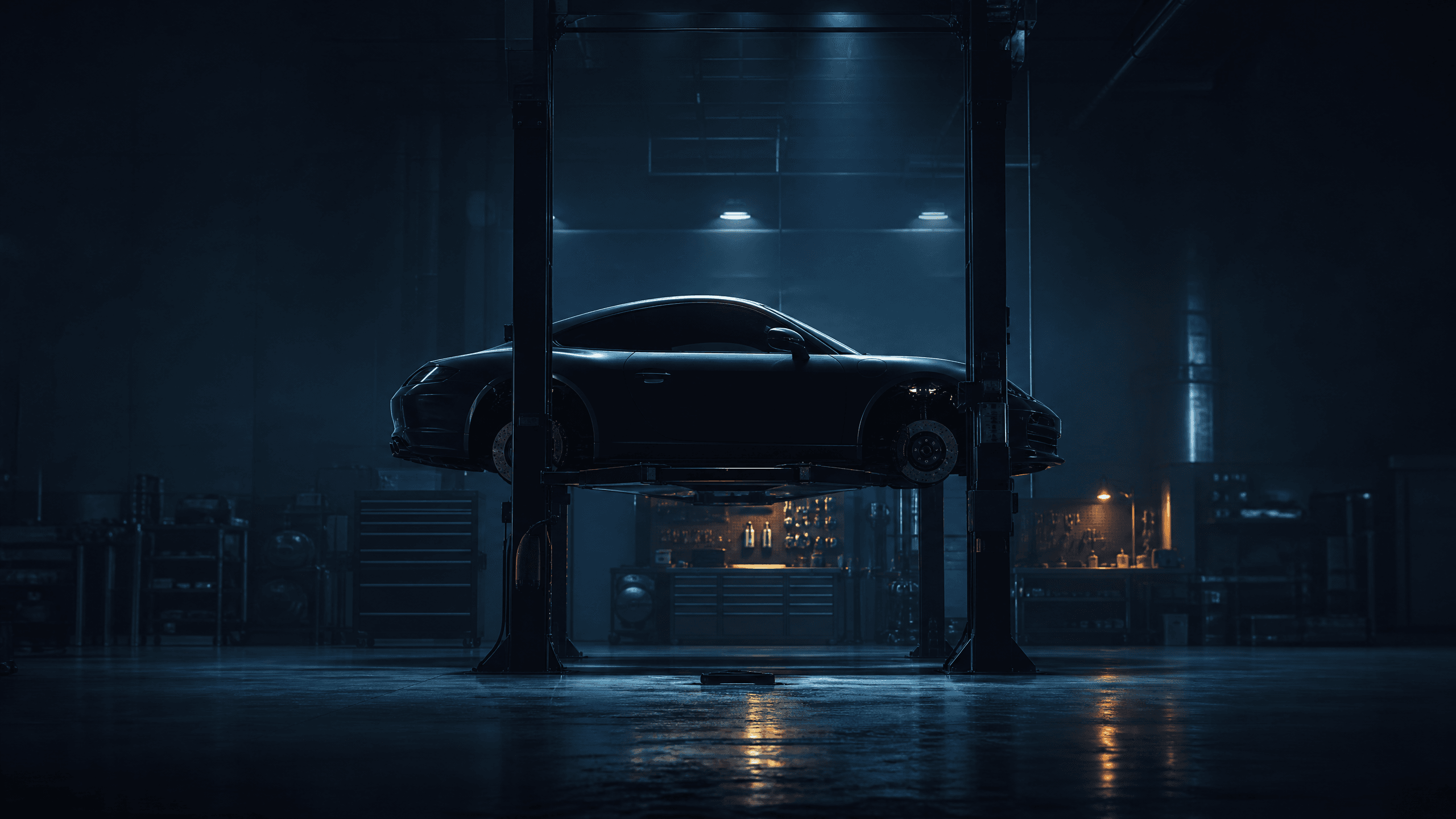 Vehicle raised on a lift inside the WeFix Collision Center workshop